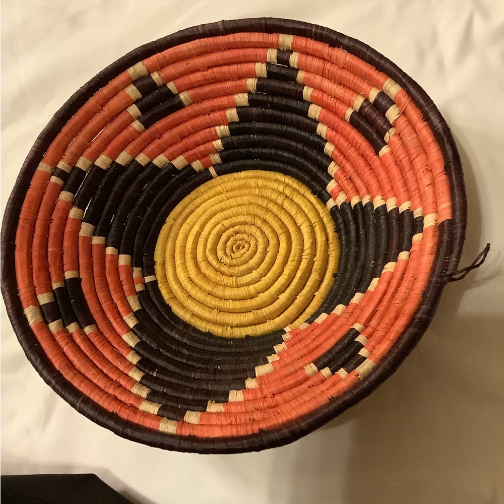 Vibrant Woven Basket with Orange and Yellow Accents